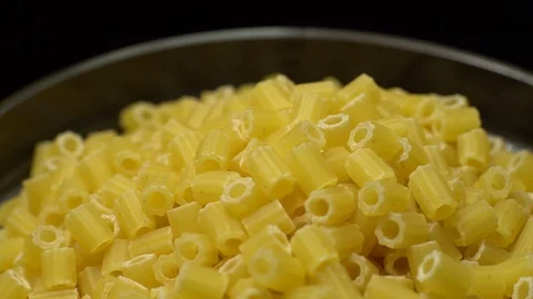 Raw macaroni in rotation. Ditalini lisci. Close up. Raw pasta. Stock Footage 101652075