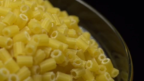 Raw macaroni in rotation. Ditalini lisci. Close up. Raw pasta. Stock Footage 101652132