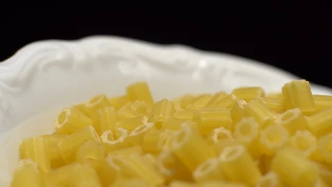 Raw macaroni in rotation. Ditalini lisci. Close up. Raw pasta. Video stock 101652207