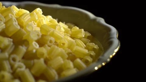 Raw macaroni in rotation. Ditalini lisci. Close up. Raw pasta. Stock Footage 101652495