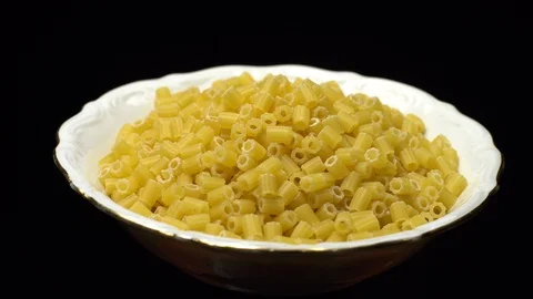 Raw macaroni in rotation. Ditalini lisci. Close up. Raw pasta. Video stock 101652502