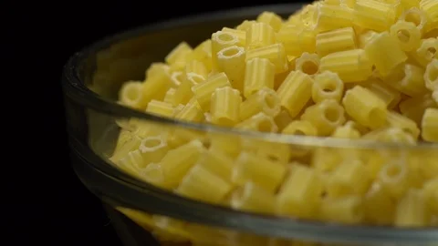 Raw macaroni in rotation. Ditalini lisci. Close up. Raw pasta. Stock Footage 101652561