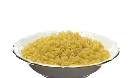 Raw macaroni in rotation. Ditalini lisci. Close up. Raw pasta. Stock Footage 101652993