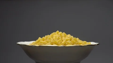 Raw macaroni in rotation. Ditalini lisci. Close up. Raw pasta. Video stock 101653039