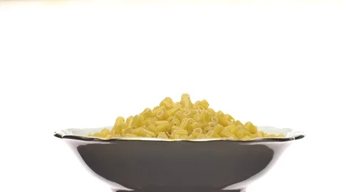 Raw macaroni in rotation. Ditalini lisci. Close up. Raw pasta. Video stock 101653371