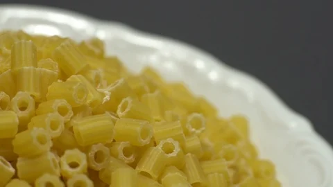 Raw macaroni in rotation. Ditalini lisci. Close up. Raw pasta. Stock Footage 101653374