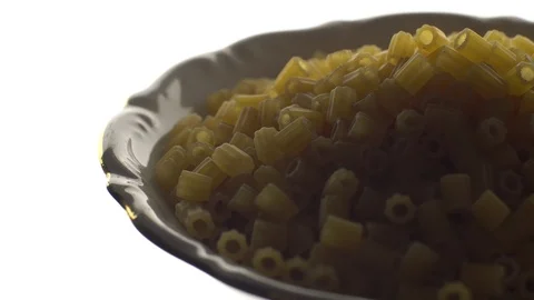 Raw macaroni in rotation. Ditalini lisci. Close up. Raw pasta. Video stock 101653527