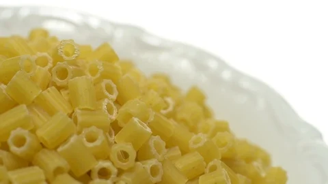 Raw macaroni in rotation. Ditalini lisci. Close up. Raw pasta. Stock Footage 101653757