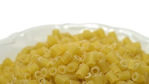 Raw macaroni in rotation. Ditalini lisci. Close up. Raw pasta. Stock Footage 101653778