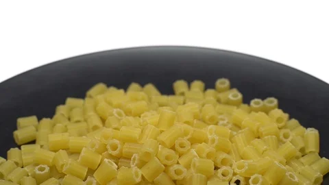 Raw macaroni in rotation. Ditalini lisci. Close up. Raw pasta. Stock Footage 101660124