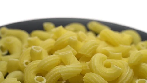 Raw macaroni in rotation. Ditalini lisci. Close up. Raw pasta. Stock Footage 101667601