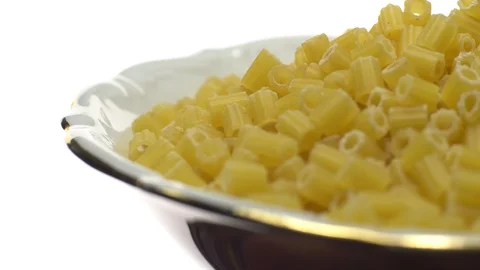 Raw macaroni in rotation. Ditalini lisci. Close up. Raw pasta. Stock Footage 101668495