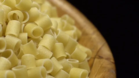 Raw macaroni in rotation. Ditalini lisci. Close up. Raw pasta. Stock Footage 101761243