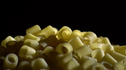 Raw macaroni in rotation. Ditalini lisci. Close up. Raw pasta. Stock Footage 101761335