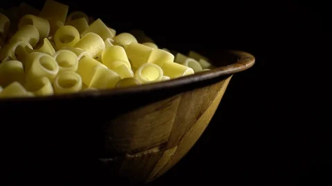 Raw macaroni in rotation. Ditalini lisci. Close up. Raw pasta. Stock Footage 101761420