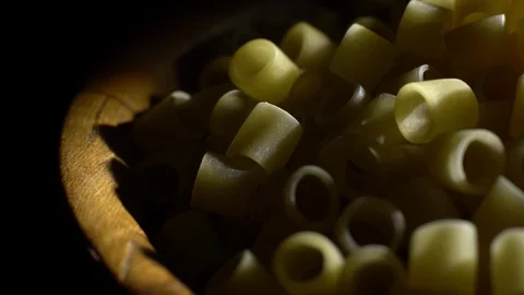 Raw macaroni in rotation. Ditalini lisci. Close up. Raw pasta. Stock Footage 101761601