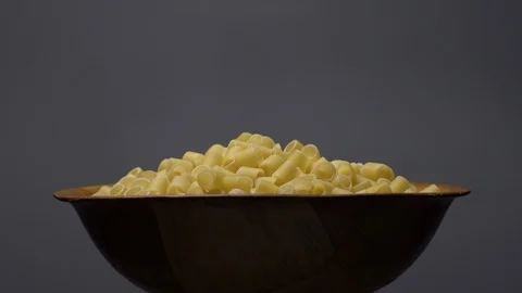 Raw macaroni in rotation. Ditalini lisci. Close up. Raw pasta. Stock Footage 101761780