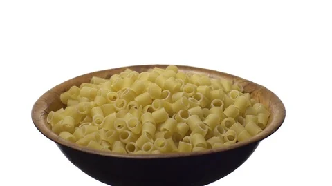 Raw macaroni in rotation. Ditalini lisci. Close up. Raw pasta. Stock Footage 101761836