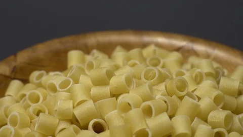 Raw macaroni in rotation. Ditalini lisci. Close up. Raw pasta. Stock Footage 101761840