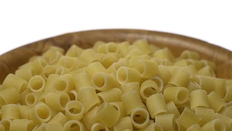 Raw macaroni in rotation. Ditalini lisci. Close up. Raw pasta. Stock Footage 101761927