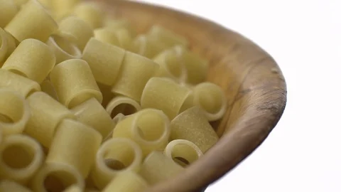 Raw macaroni in rotation. Ditalini lisci. Close up. Raw pasta. Stock Footage 101762069