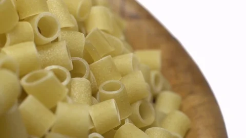 Raw macaroni in rotation. Ditalini lisci. Close up. Raw pasta. Stock Footage 101762218