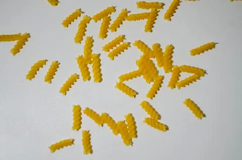 Raw macaroni on a white table 写真素材