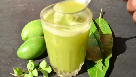 Raw Mango Drink, Slow motion video. Stock Footage 243562092