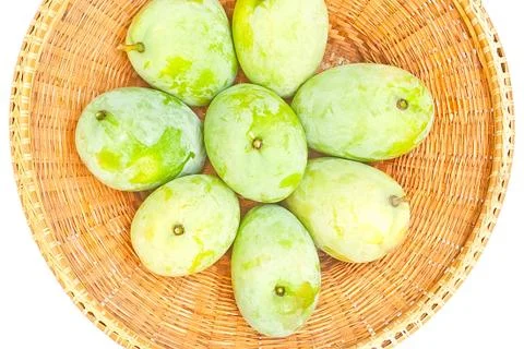Raw mangoes Stock Photos