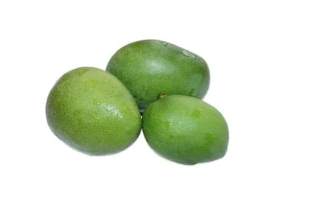 Raw mangoes Stock Photos