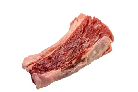 Raw marbled beef, brisket lying on white background. Isolated. Stock Photos