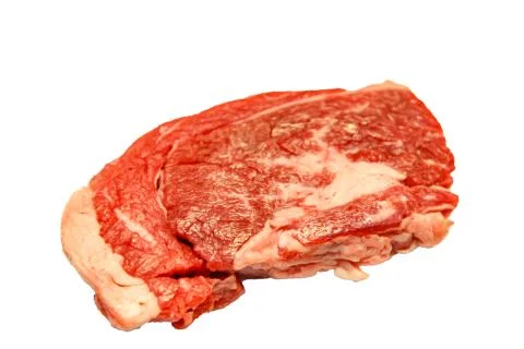 Raw marbled beef, brisket lying on white background. Isolated. Stock Photos