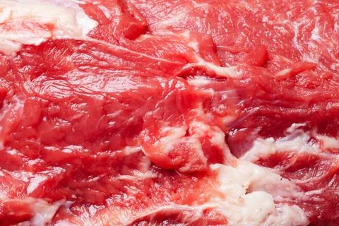 Raw marbled beef, close-up, background, texture Stock Photos