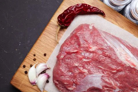 Raw marbled beef on a cutting board, place for your text Foto stock