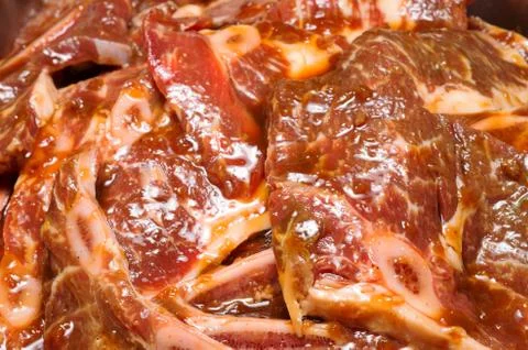 Raw marinaded beef steaks 스톡 사진