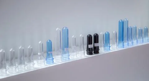 Raw material for plastic bottle process Stock Photos