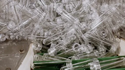 Raw Material of Plastic Bottle. Stretch or injection molding Process Empty Stock Footage 334587695