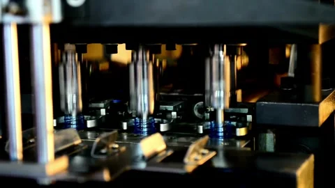 Raw Material of Plastic Bottle. Stretch or injection molding Process Empty Stock Footage 334587729