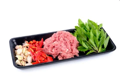 Raw material pork fried basil spicy menu of Thai food. Minced beef meat/Chill Stock-Fotos