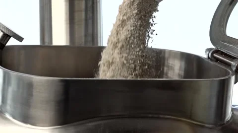 Raw material pours into the tank 스톡 동영상 64903995