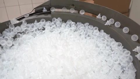 Raw material used for making plastic bottle PET, PETE. on mineral water and Stock-Footage 334588971