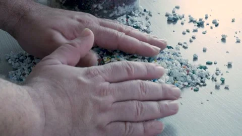 Raw materials for recycled plastic are used in manufacturing. Stock-Footage 233382903