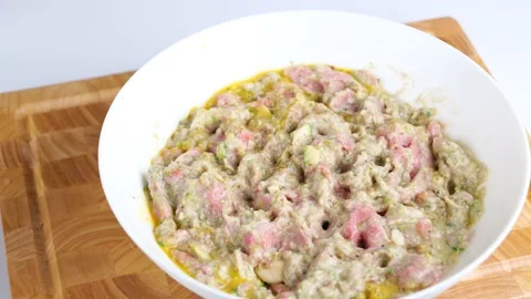 Raw meat balls making process with spices and herbs Stock Footage 149264362