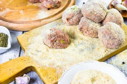 Raw meat balls minced beef rolled breadcrumbs Stock Photos