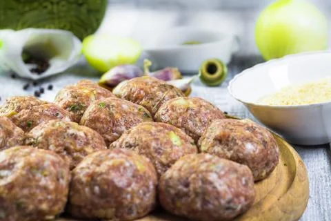 Raw meat balls minced beef prepared roll breadcrumbs Stock Photos