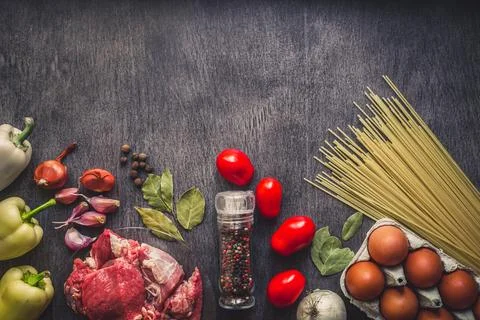 Raw meat beef with spaghetti, fresh organic vegetables, onion, garlic, spic.. Stock Photos