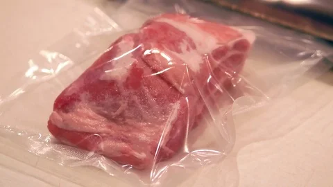 Raw meat being vacuum packed for sous vide cooking Stock Footage 83515329