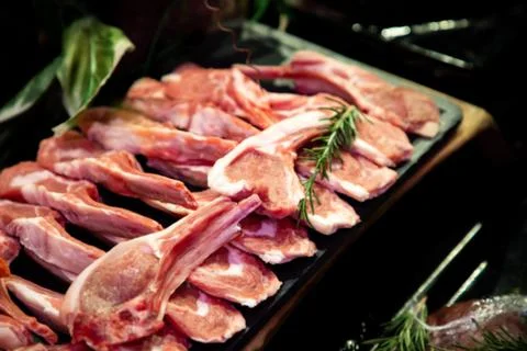 Raw meat on the bench in the store Stock Photos