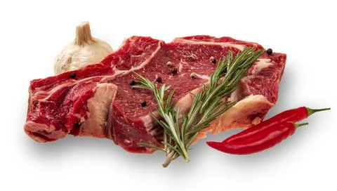 Raw meat on the bone. pepper pods, rosemary. white background Stock Photos