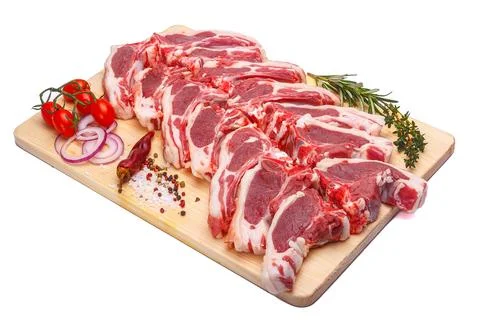 Raw meat brisket, beef bone, wooden cutting board, white isolated background Stock Photos